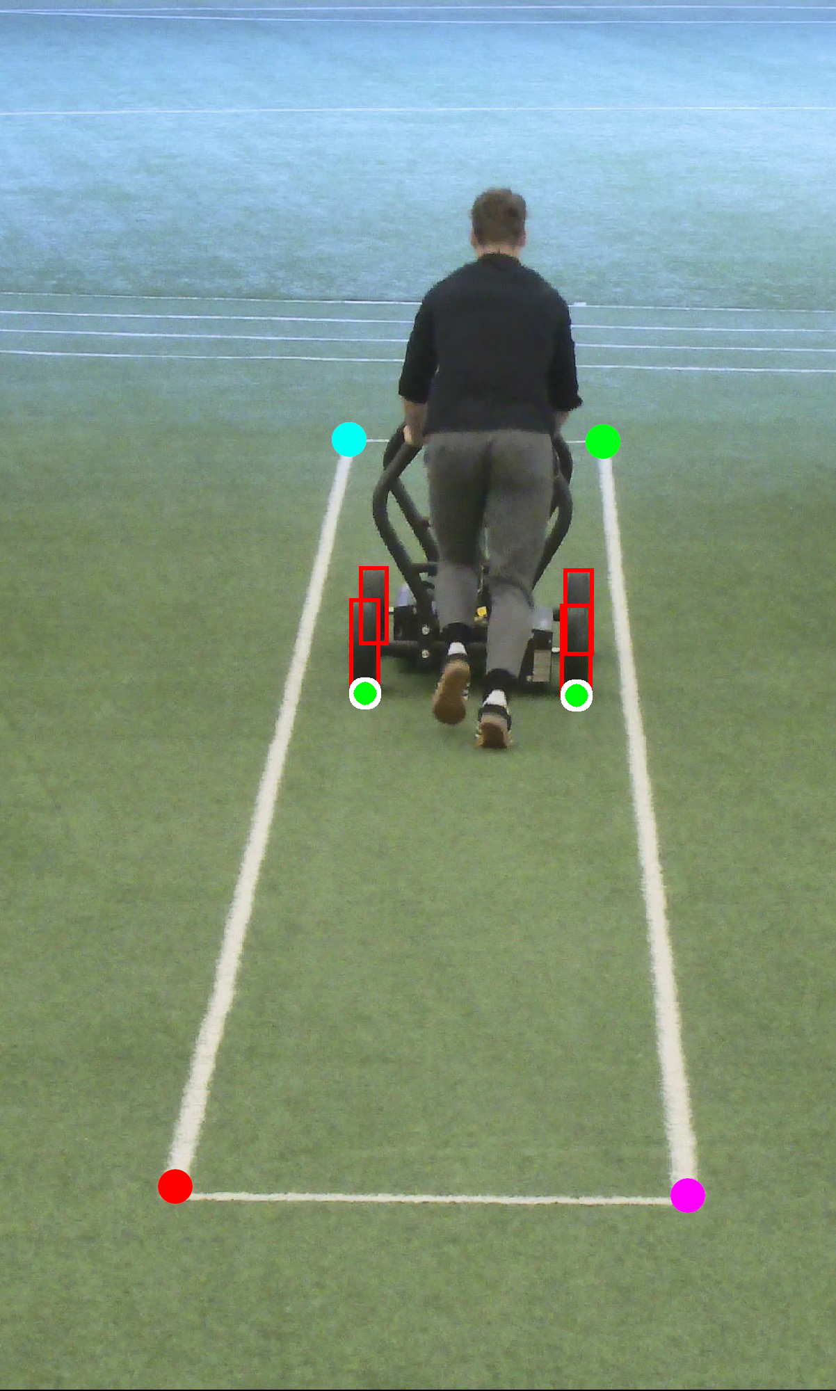 Camera view of the cart in a later frame, with new wheel annotations